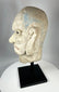 Hand-carved Chinese stone head depicting a Luohan disciple of Buddha, 18th–19th century.