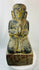 Burmese Buddhist kneeling attendant sculpture with hands pressed together in prayer.