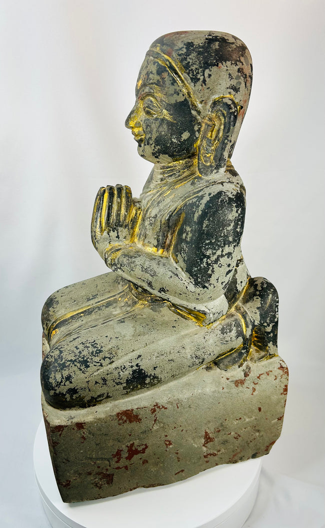 Antique Myanmar carved wood devotional figure with aged lacquer and gold leaf remnants.