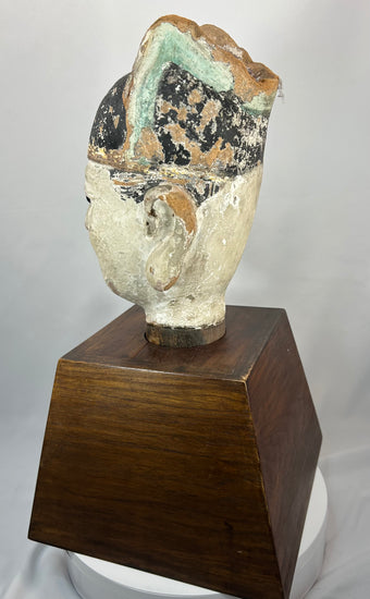 Antique Chinese painted terracotta official figure with aged patina and lacquer traces.