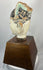 Antique Chinese painted terracotta official figure with aged patina and lacquer traces.