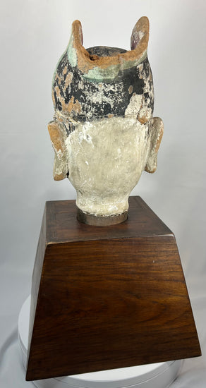 Chinese architectural terracotta bust depicting a scholar-official with ceremonial headdress.