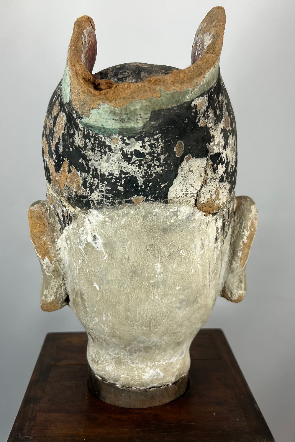 Chinese carved terracotta bust representing a scholar-official from the Qing period.