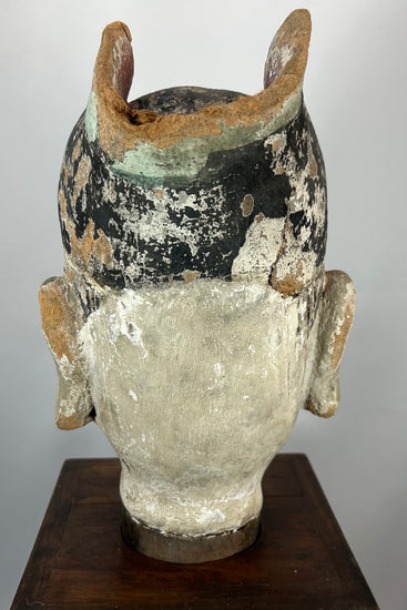 Chinese carved terracotta bust representing a scholar-official from the Qing period.