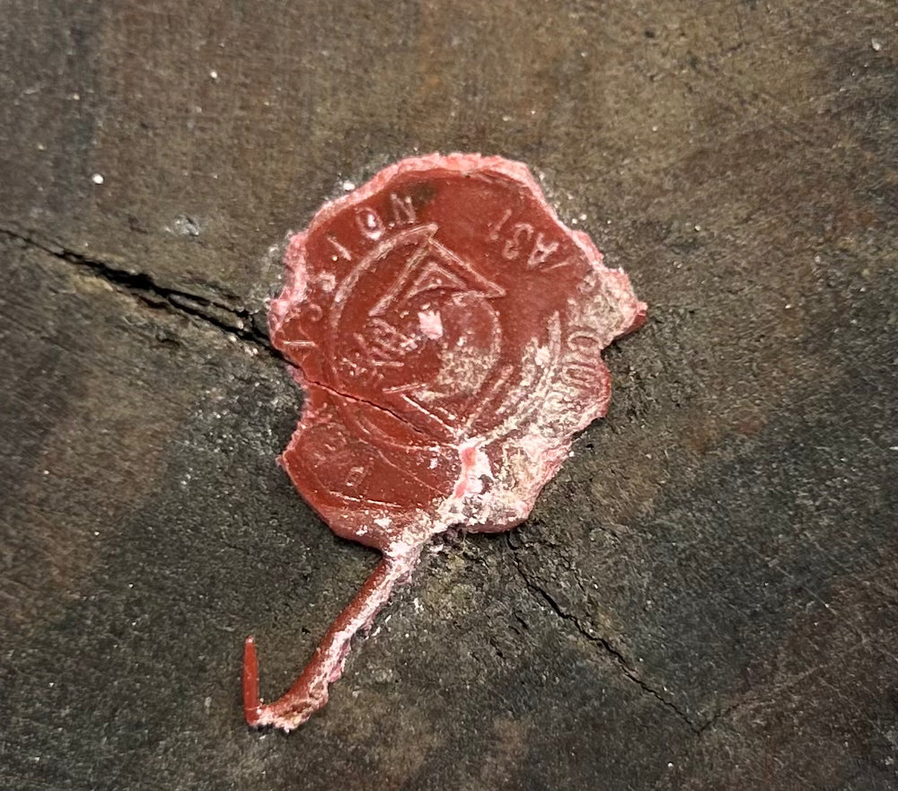 Chinese terracotta bust of a ceremonial court official mounted on wooden base.