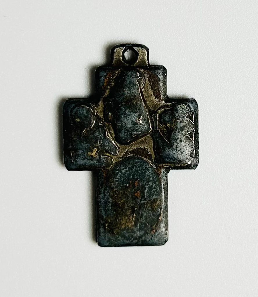 antique European bronze devotional cross with Marian figures and raised relief decoration, discovered near a Nova Scotia maritime wreck site
