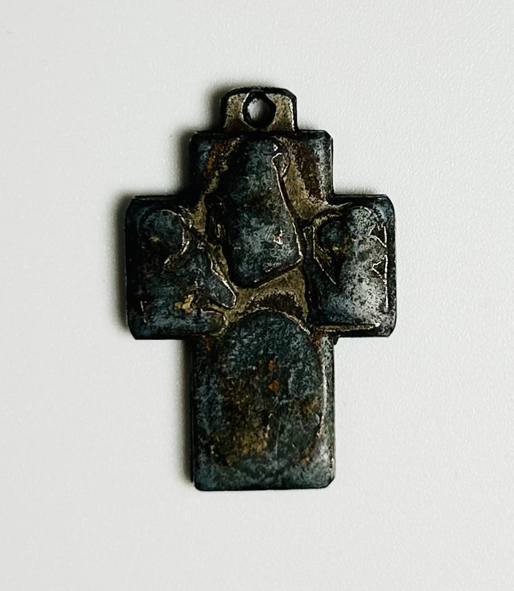 antique European bronze devotional cross with Marian figures and raised relief decoration, discovered near a Nova Scotia maritime wreck site