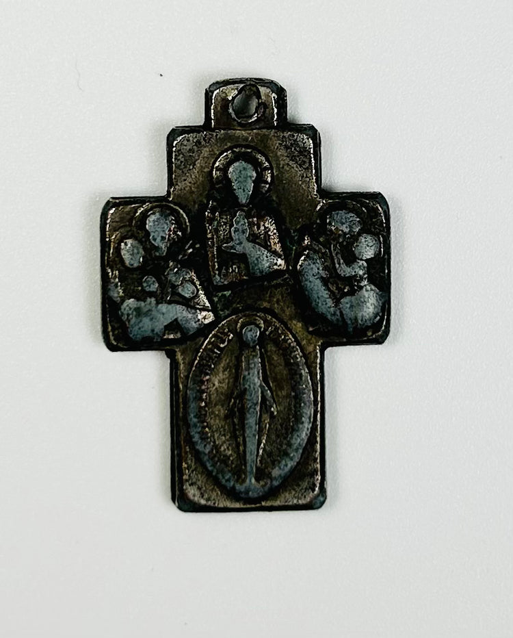 19th century Christian bronze cross pendant with raised Marian iconography and aged patina, recovered along the Nova Scotia coast