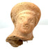 Ancient Etruscan female head fragment displaying a smooth elevated coiffure, elongated nose, delicate facial features, and natural surface wear.