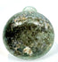 Eastern Mediterranean Roman glass unguentarium featuring a slender neck, rounded shoulders, and extensive natural surface patination.