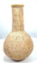 Roman Imperial perfume container with a nearly spherical body, pale buff-coloured stone surface, and scattered earthy encrustations.