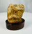Carved limestone baboon figurine from ancient Egypt with archaeological patina.