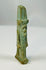 Ancient Egyptian Nefertem amulet in glazed faience with lotus headdress.