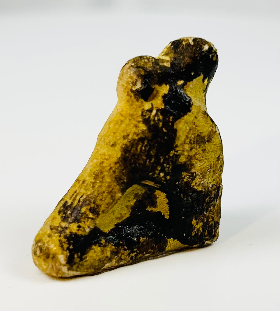 Egyptian protective amulet depicting the sacred falcon of Horus.