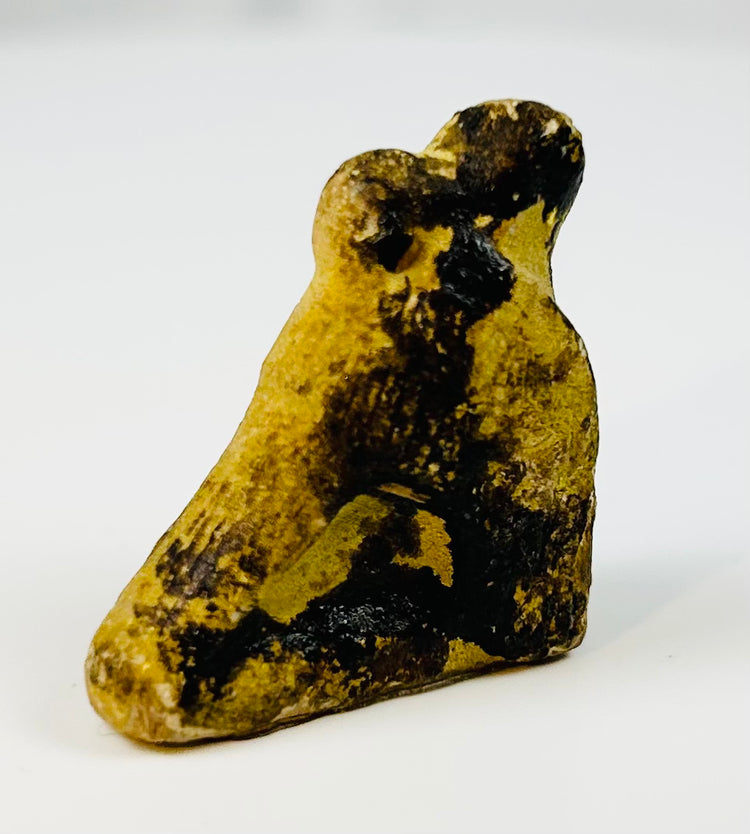 Egyptian protective amulet depicting the sacred falcon of Horus.