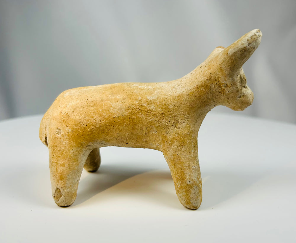 Stylized terracotta animal figure from ancient Persia Amlash region artifact.