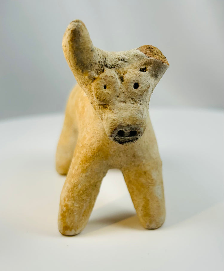 Ancient Iranian Amlash terracotta bovine sculpture mounted on display stand.
