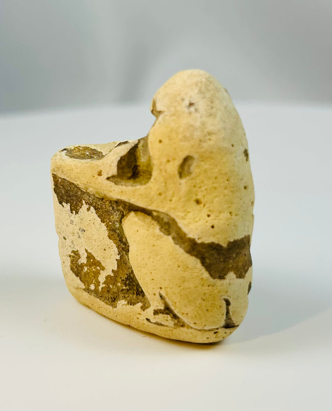 Ancient Egyptian temple offering vessel in the form of a seated baboon, carved limestone figure