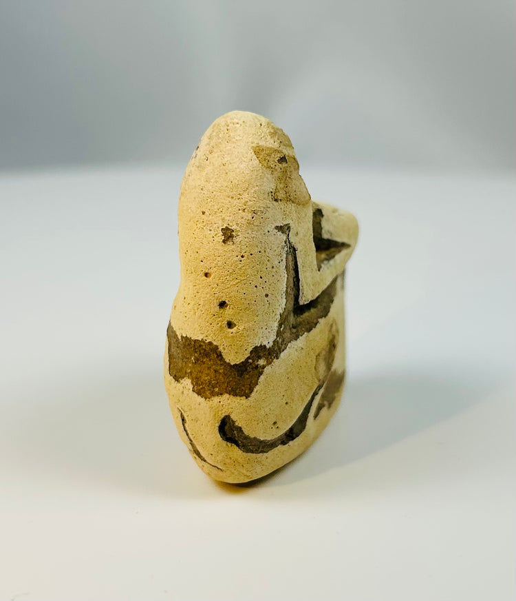 Ancient Egyptian limestone baboon devotional carving with recessed vessel basin