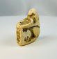 Ancient Egyptian baboon figure carved in limestone with votive offering container