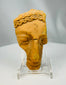 Ancient Mediterranean terracotta dramatic mask fragment with expressive facial modeling