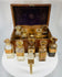 antique pharmaceutical box with labeled glass containers and cork stoppers