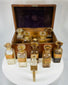antique pharmaceutical box with labeled glass containers and cork stoppers