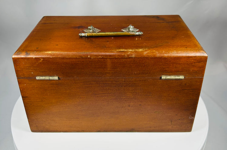 19th century pharmacy storage box with period medicine labels