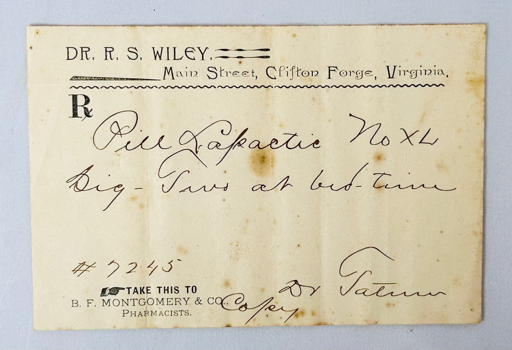 historic mahogany apothecary chest with prescription slips and medicine bottles