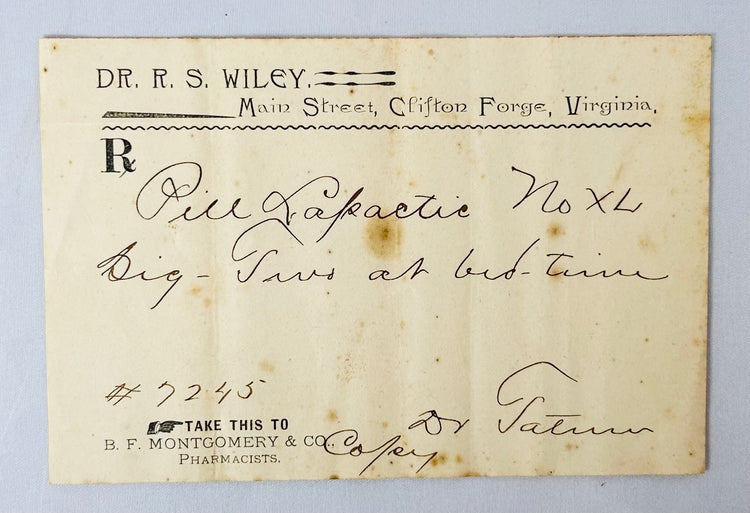 historic mahogany apothecary chest with prescription slips and medicine bottles