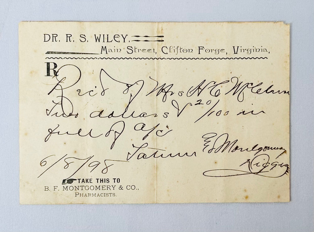 early American pharmacy kit with glass bottles and handwritten dosage notes