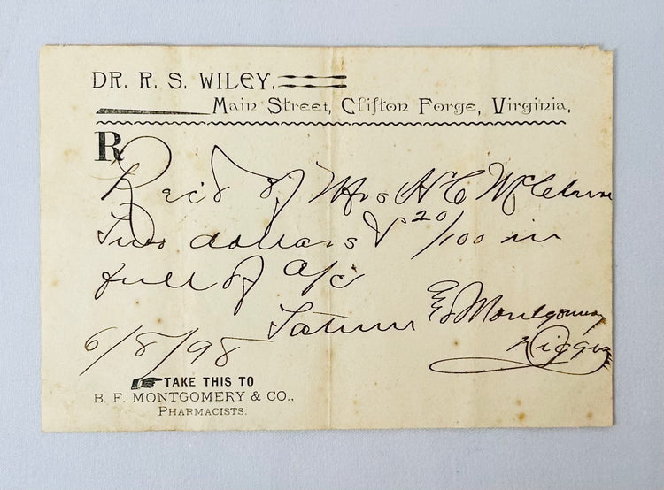 early American pharmacy kit with glass bottles and handwritten dosage notes