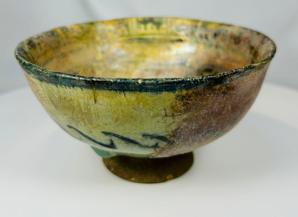 Seljuk era ceramic bowl with pedestal foot and figural interior decoration