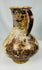 Seljuk era glazed ceramic ewer with stylized vegetal decoration