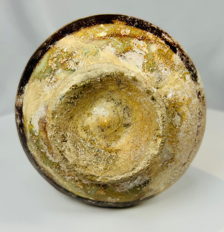 Archaeological Kashan ceramic ewer with aged glaze and mineral patina