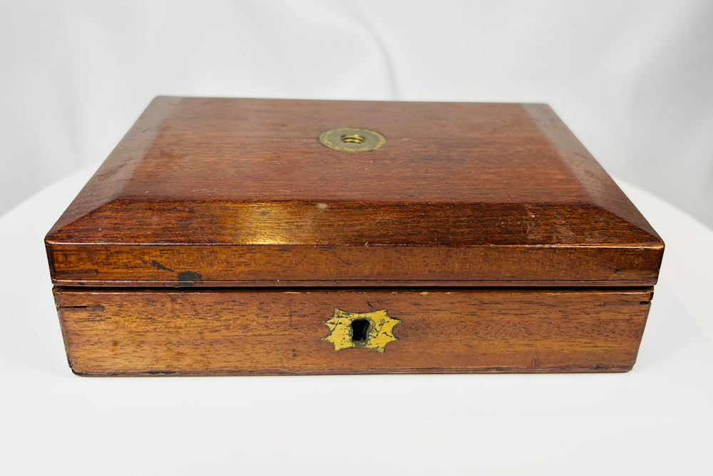 antique brass microscope with glass lenses and wooden case