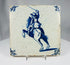antique Delft blue and white ceramic tile with rider motif