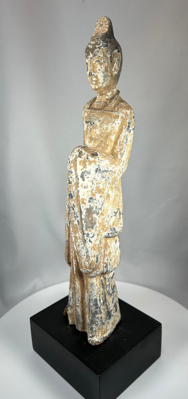 Chinese Northern Wei earthenware court figure with traces of pigment