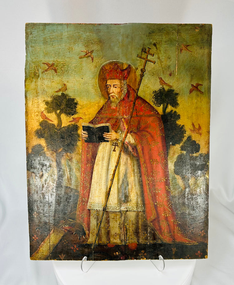 Mexican folk devotional retablo with robed church figure and landscape background