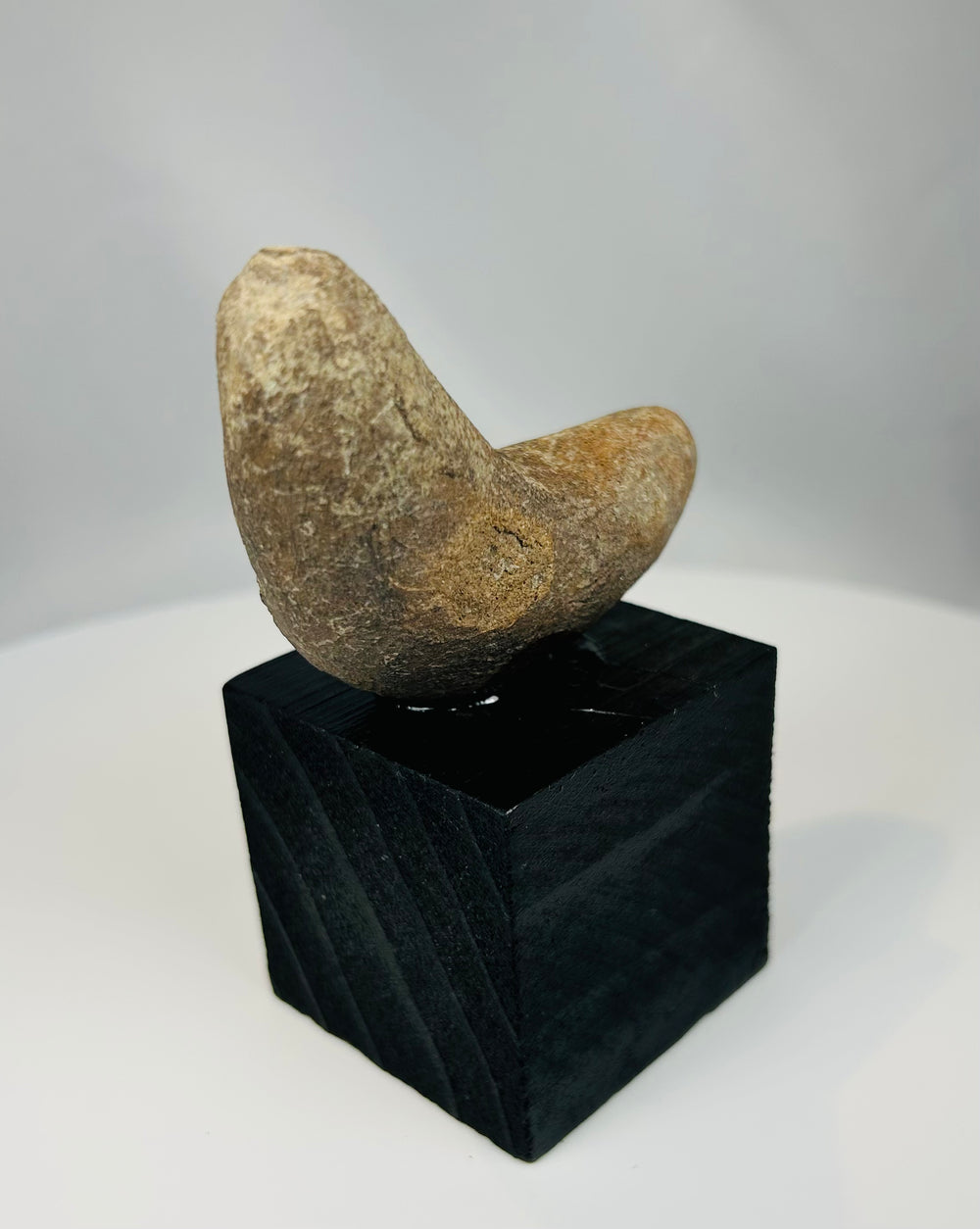 Small Pre-Columbian grinding stone tool from Mesoamerican or Northern South American culture