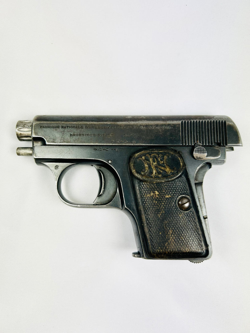 Early 1900s Browning FN Model 1906 semi-automatic pocket pistol, Belgium, collectible firearm, safe display