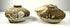 Pair of 15th–16th-century Ming Dynasty stoneware jars recovered from Philippine waters, showcasing traditional Chinese ceramic craftsmanship and maritime trade history.