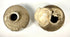 Chinese Ming Dynasty shipwreck artifacts featuring two brown-glazed stoneware jarlets with distinctive rounded forms, marine shell encrustations, and archaeological patina.