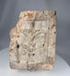 Historic European stone architectural fragment with relief carving of the Crucifixion and surrounding structures