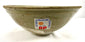Ancient Song Dynasty celadon ware bowl measuring approximately 6.75 inches in diameter, featuring a glazed interior and traditional incised floral decoration.