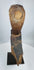 Southeast Asian spiritual hardwood carving mounted on a metal stand with aged patina