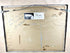 Original reverse inscriptions and artist identification labels on Alfred Gabali’s Ships That Pass in the Night, documenting its title, dedication, and circa 1958 date.
