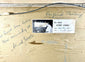 Reverse of Alfred Gabali’s Ships That Pass in the Night oil painting, preserving the artist’s original title label and historical identification details.