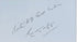 Close-up of the handwritten inscription attributed to Dr. Edmund Tapp, mounted within the mummy-wrapping display.