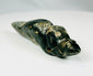 Pre-Columbian jade-type stone carving with perforation for suspension as amulet